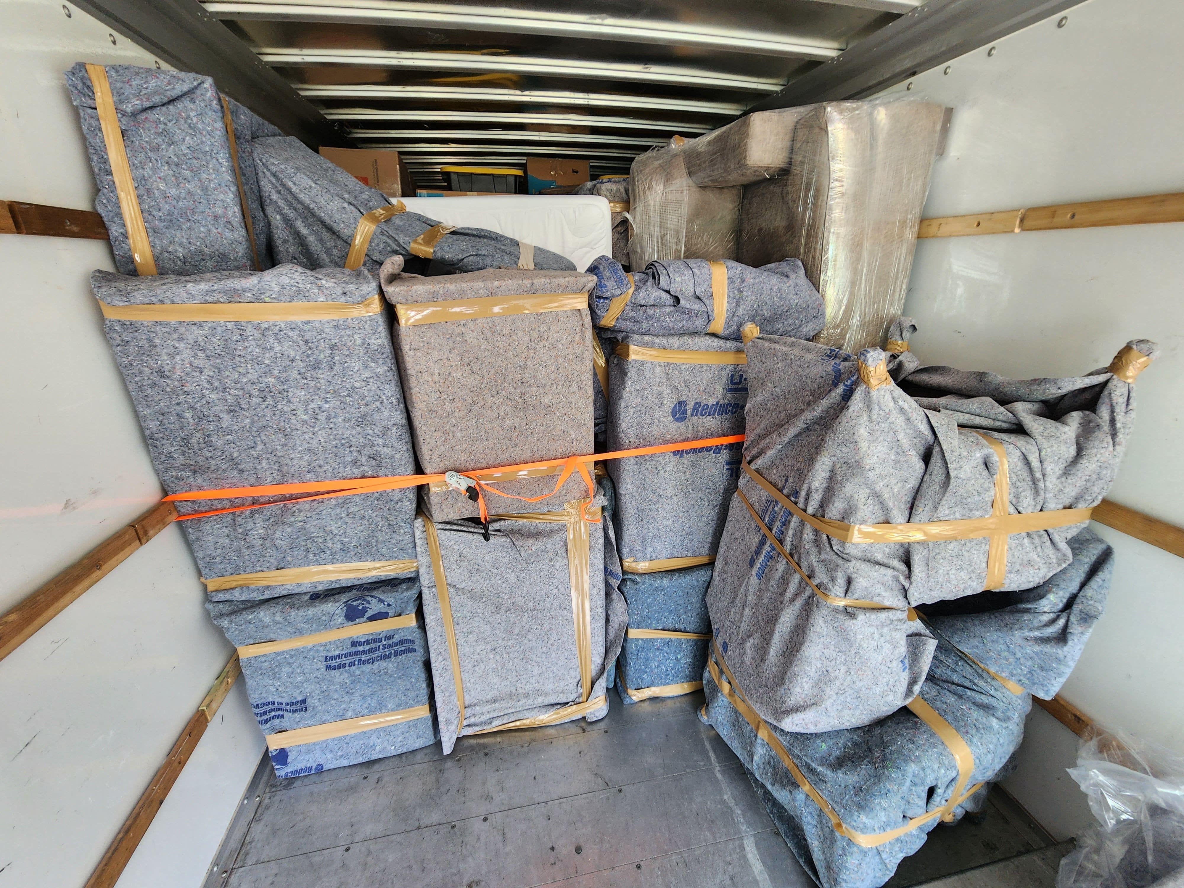 Packed moving boxes in moving truc